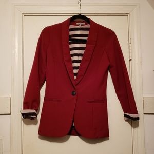 Crimson blazer with black/white stripe lining